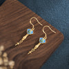 Handcrafted Nepalese-inspired Gold Earrings in Colorful Design